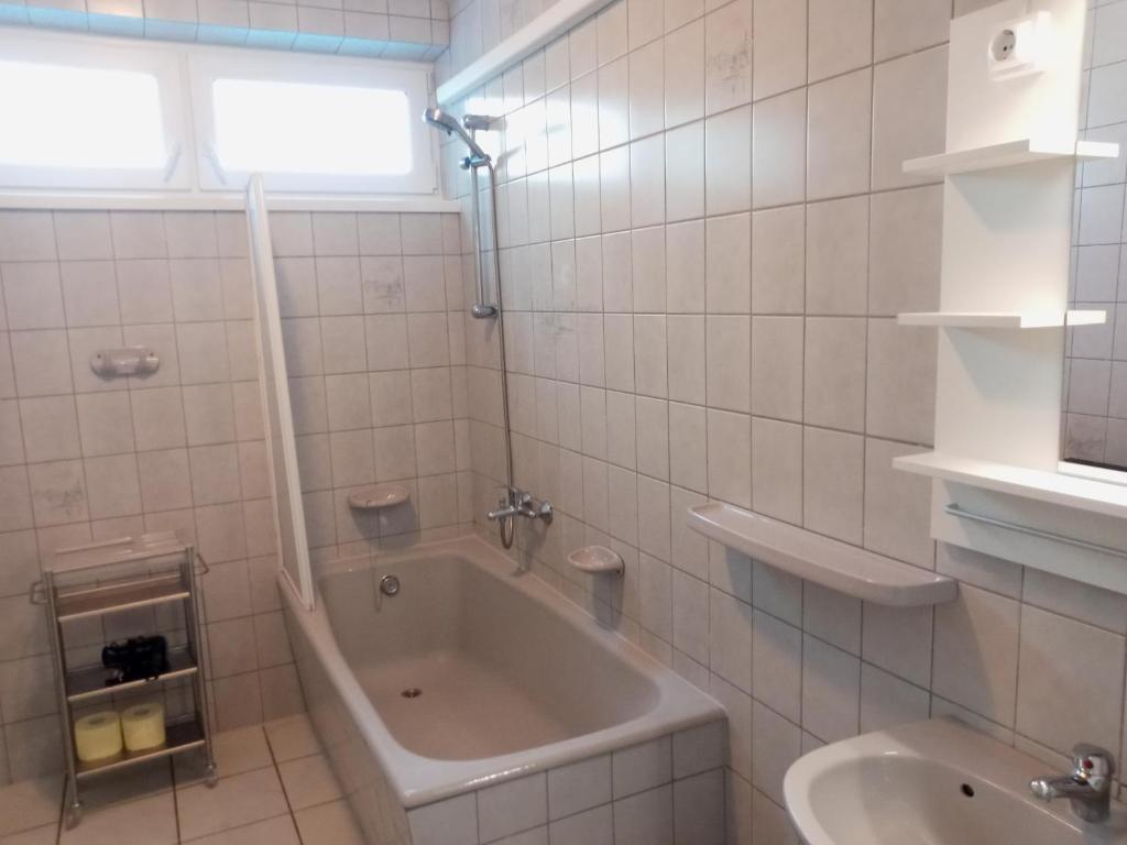 Kúpeľňa v ubytovaní Sylvia Apartman