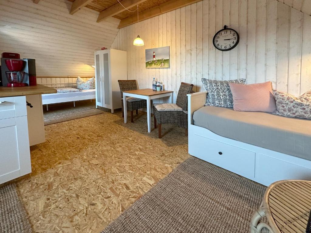 Postel nebo postele na pokoji v ubytování Ferienwohnungen im Schwedenstil
