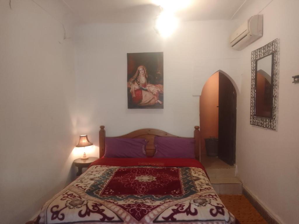 Postel nebo postele na pokoji v ubytování Riad Dar Zaida