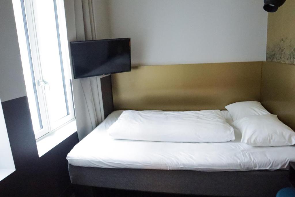 Postel nebo postele na pokoji v ubytování Comfort Hotel Karl Johan