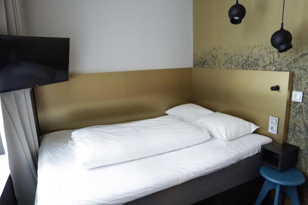 Postel nebo postele na pokoji v ubytování Comfort Hotel Karl Johan