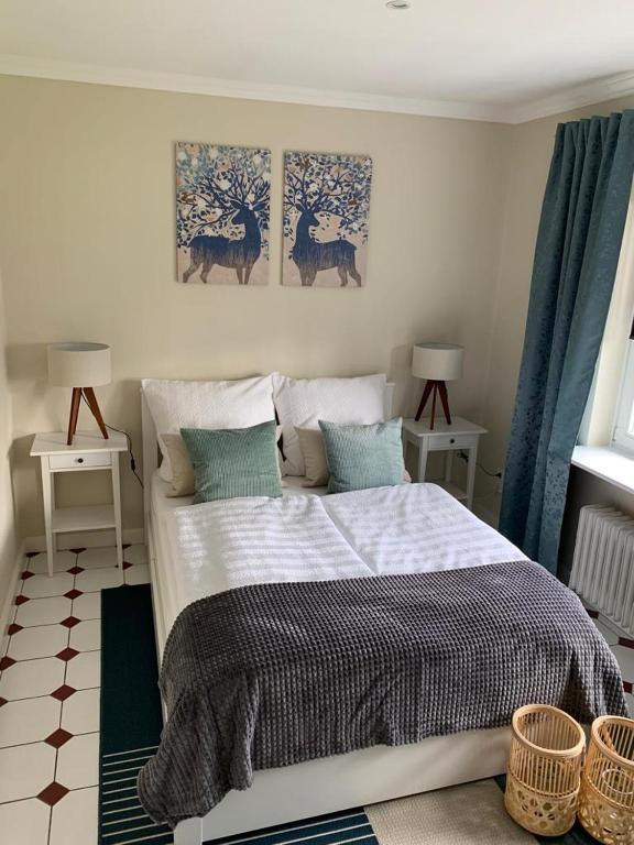 Postel nebo postele na pokoji v ubytování Ferienhaus Bendestorf, Waldweg 38,Nähe Hamburg