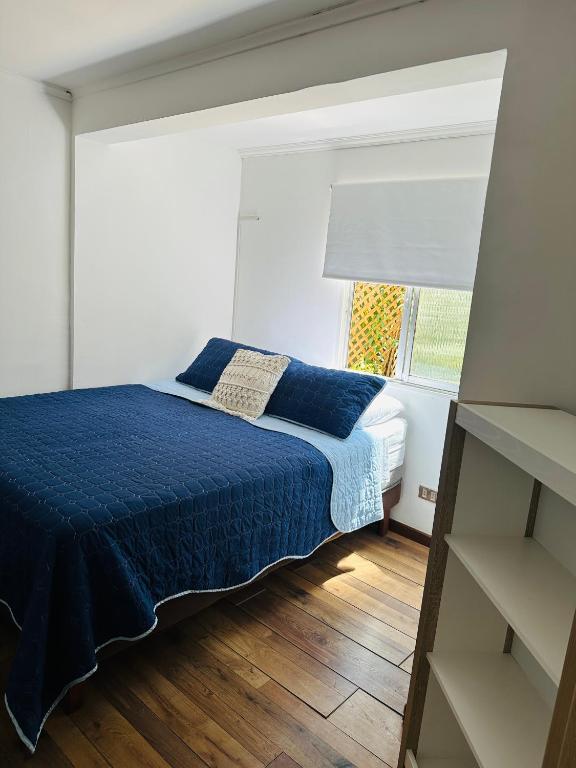 Postel nebo postele na pokoji v ubytování MAKTVB Costanera - Hostal Boutique