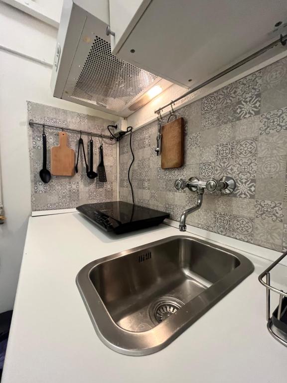 Kuchyň nebo kuchyňský kout v ubytování Bertolazzi Apartment