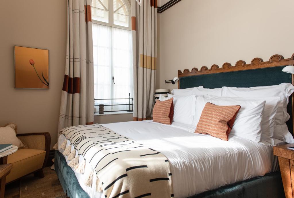 Postel nebo postele na pokoji v ubytování Soho House Tel Aviv