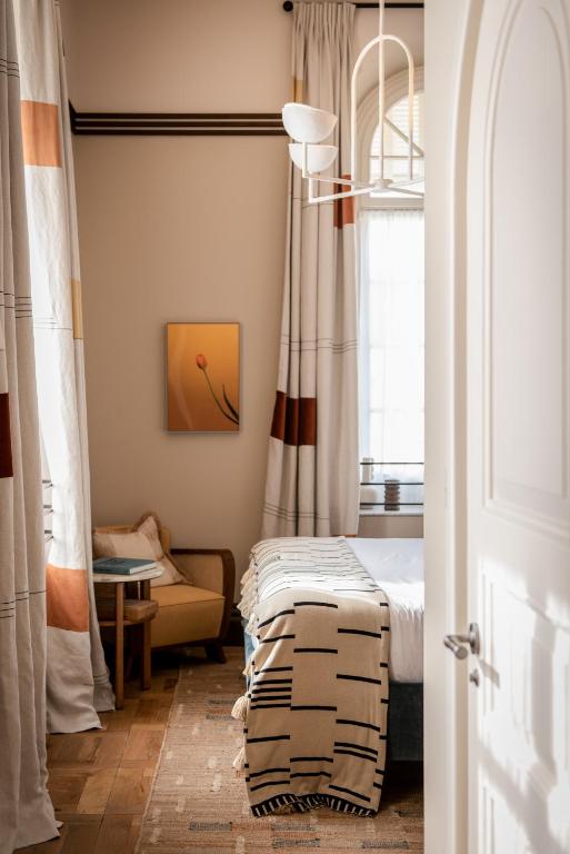 Postel nebo postele na pokoji v ubytování Soho House Tel Aviv