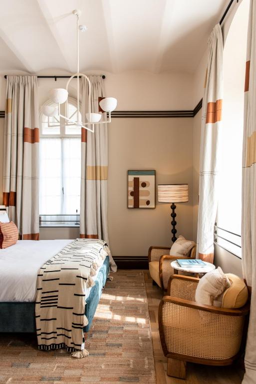 Postel nebo postele na pokoji v ubytování Soho House Tel Aviv