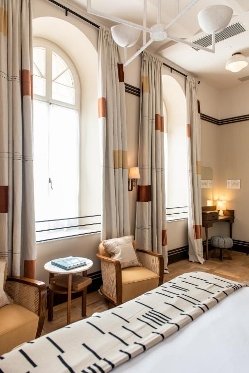 Postel nebo postele na pokoji v ubytování Soho House Tel Aviv