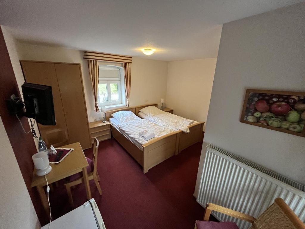 TV a/nebo společenská místnost v ubytování Privatquartier van Dreuten