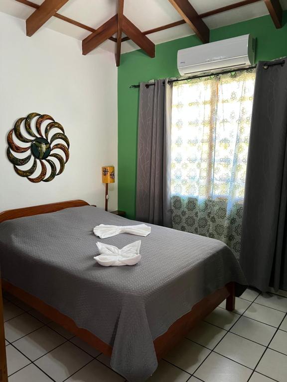 Postel nebo postele na pokoji v ubytování Cabinas El Colibri
