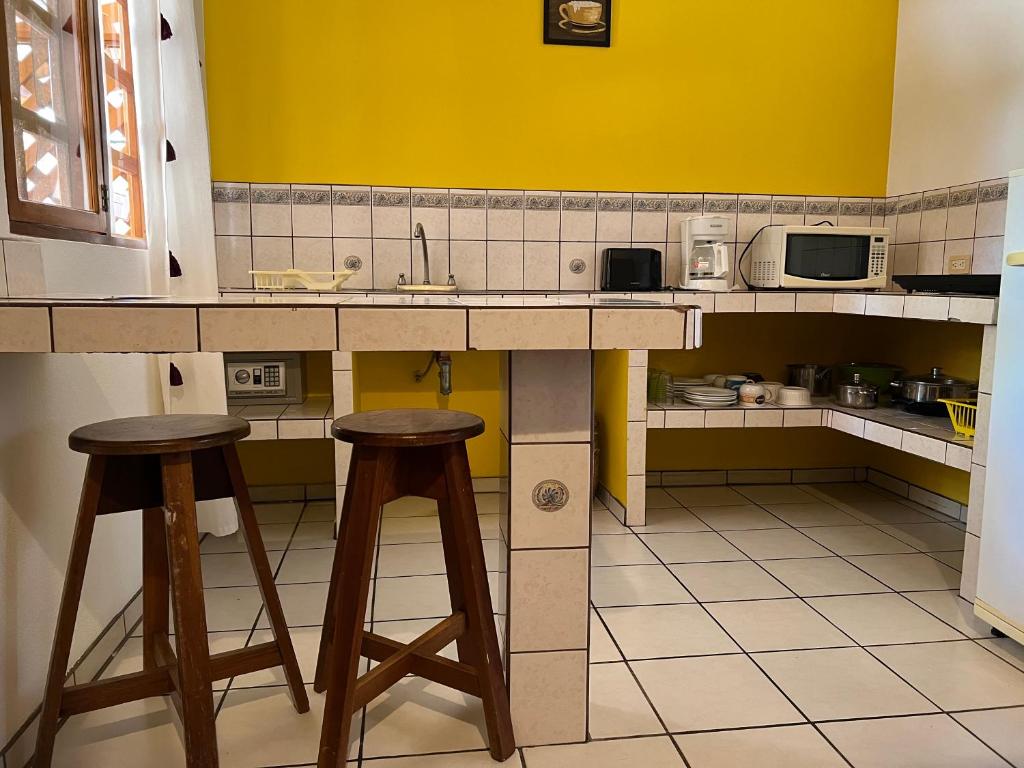 Kuchyň nebo kuchyňský kout v ubytování Cabinas El Colibri