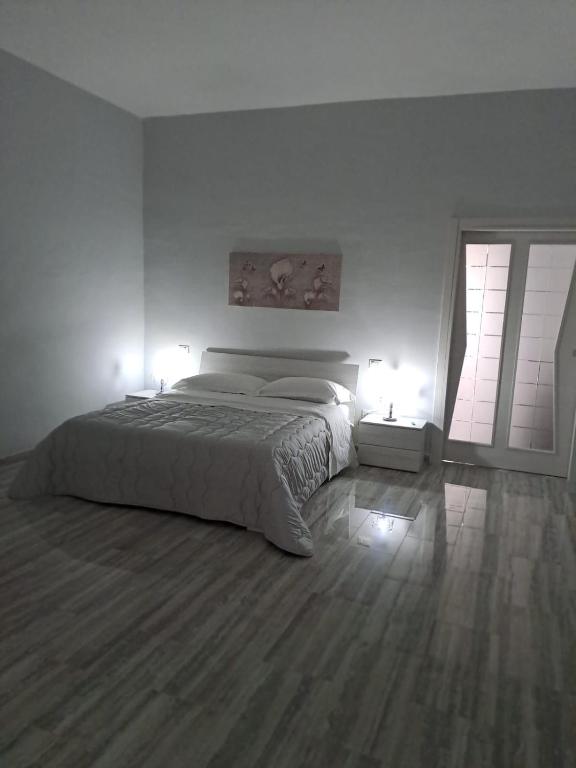 Postel nebo postele na pokoji v ubytování Casa Rosy