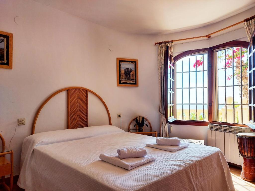 Postel nebo postele na pokoji v ubytování Villa Torreón