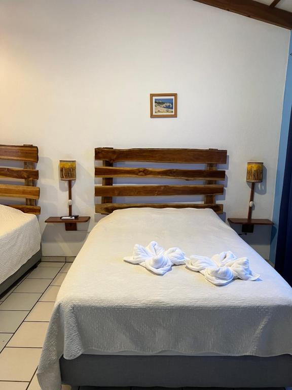 Postel nebo postele na pokoji v ubytování Cabinas El Colibri