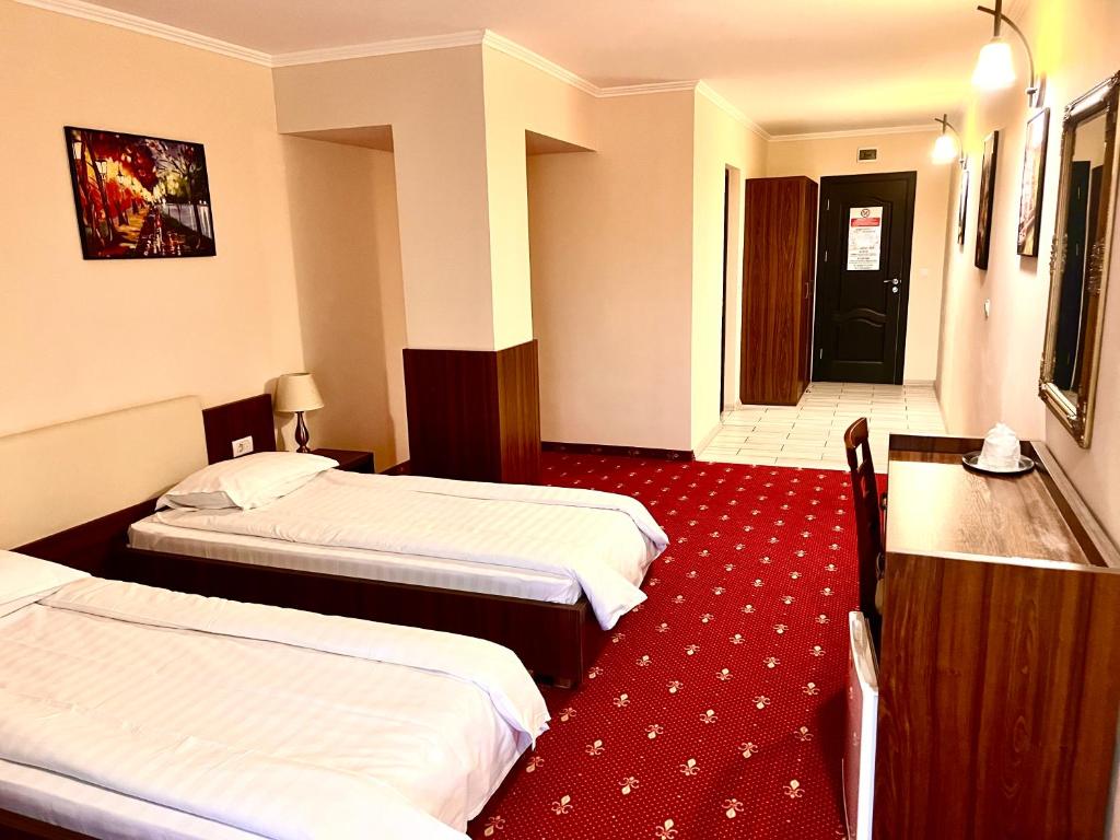 Postel nebo postele na pokoji v ubytování Complex Azar