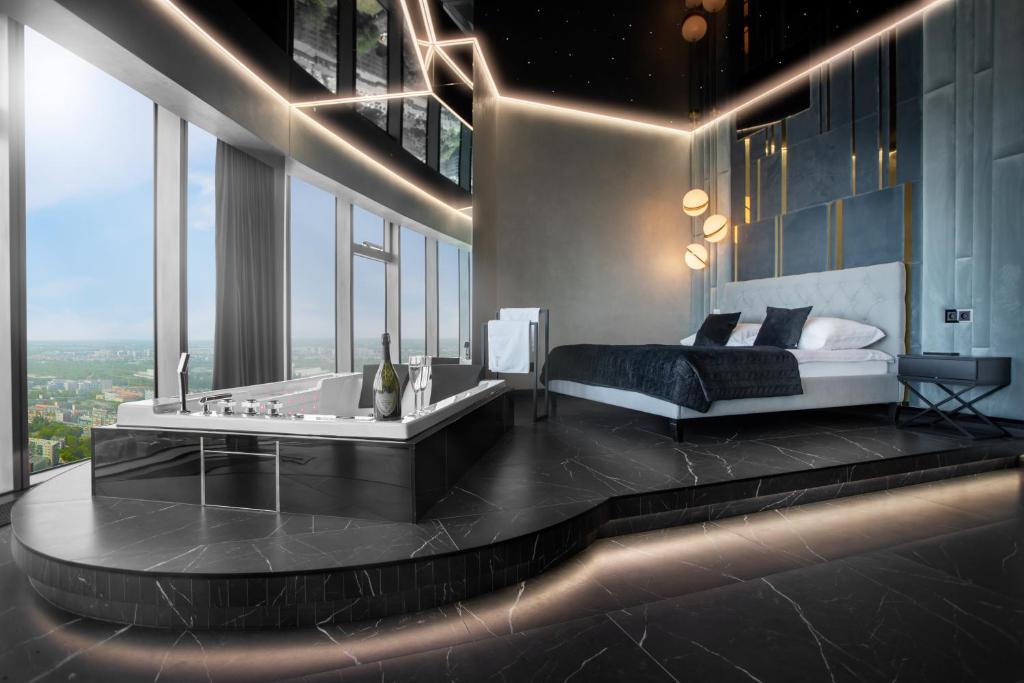Posteľ alebo postele v izbe v ubytovaní In The Sky - Apartamenty w Sky Tower