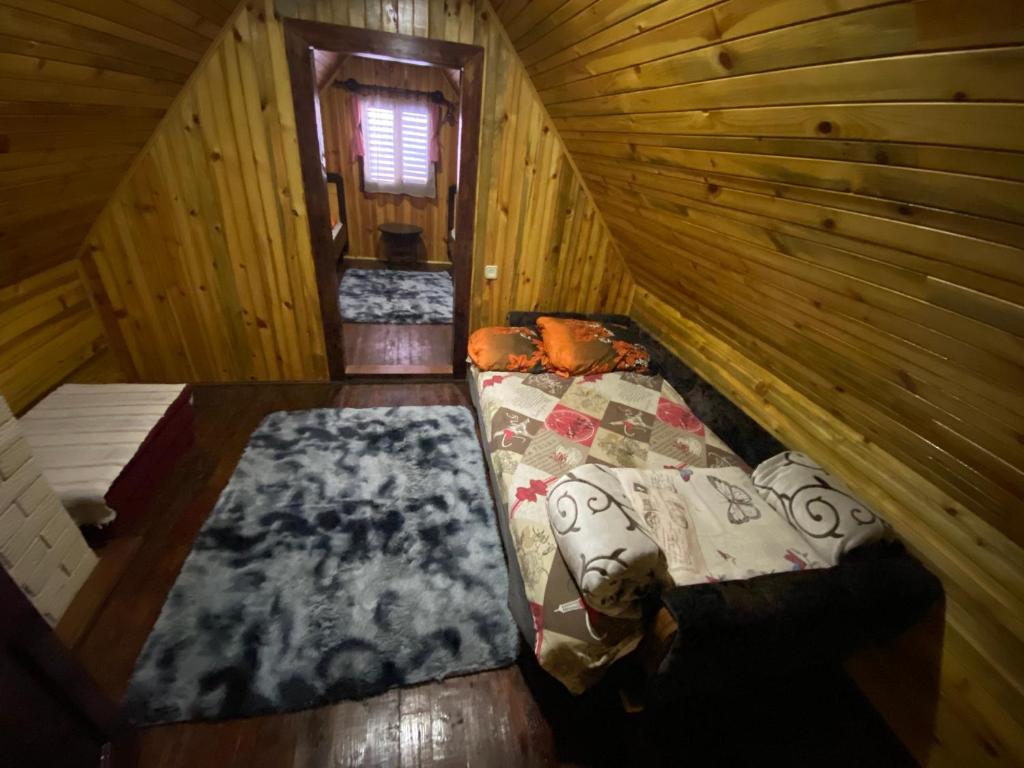 Postel nebo postele na pokoji v ubytování Apartment Sarganska Osmica