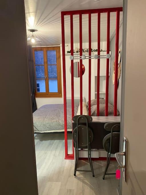 Postel nebo postele na pokoji v ubytování Appart hôtel Toucy 2