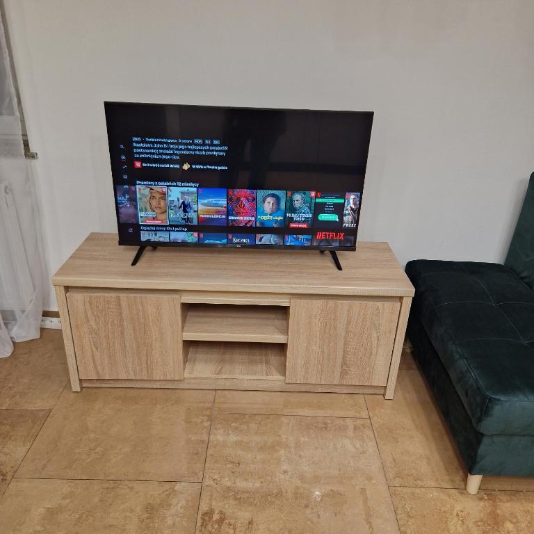 Televízia a/alebo spoločenská miestnosť v ubytovaní ewja 3