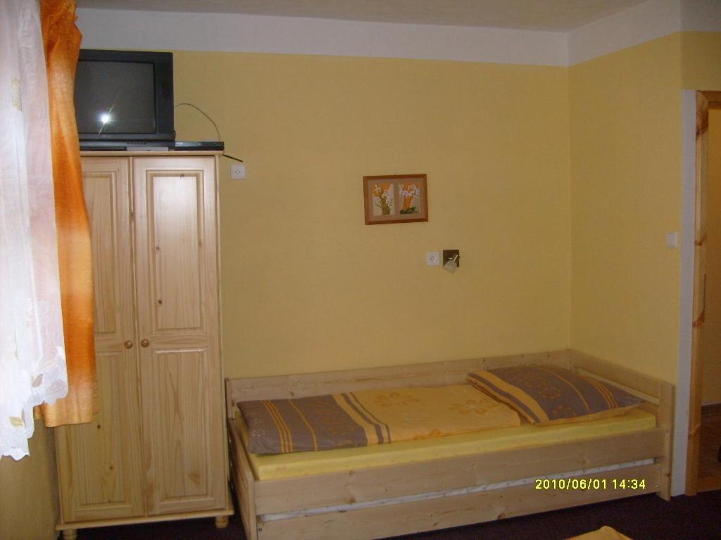 Postel nebo postele na pokoji v ubytování Rekreační dům Slavonice