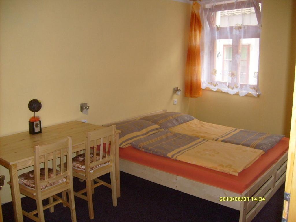 Postel nebo postele na pokoji v ubytování Rekreační dům Slavonice