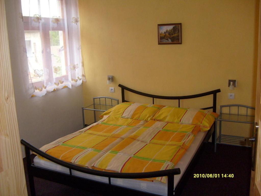 Postel nebo postele na pokoji v ubytování Rekreační dům Slavonice