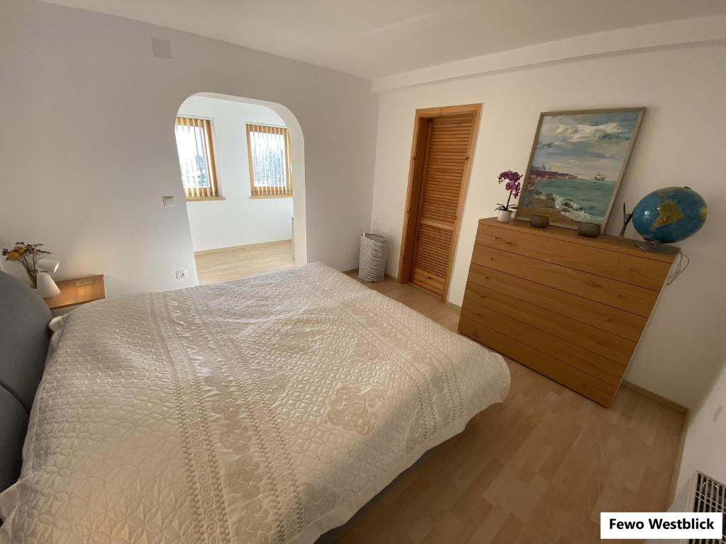 Postel nebo postele na pokoji v ubytování Haus am Hügel