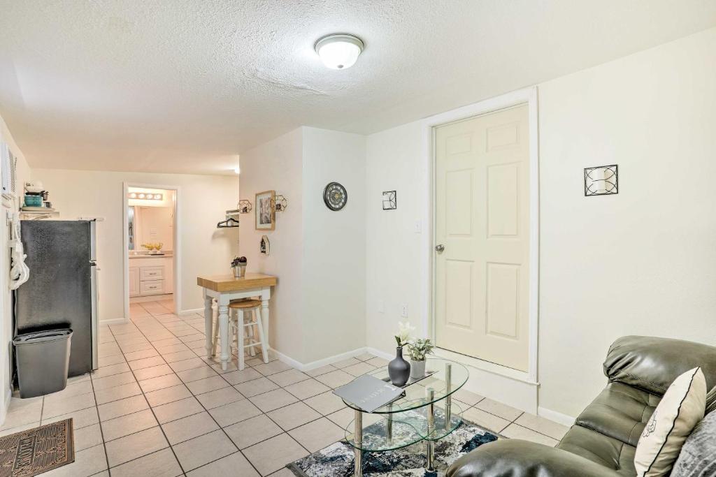 a living room with a couch and a table at Lakeland Vacation Rental 38 Mi to Disney! in Lakeland