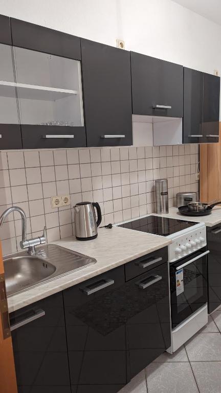 Virtuvė arba virtuvėlė apgyvendinimo įstaigoje Ferienwohnung
