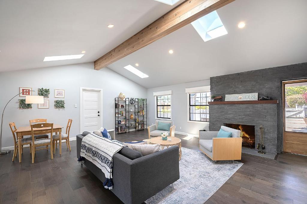 a living room with a couch and a fireplace at 3849 La Vista Portola home in Del Rey Oaks