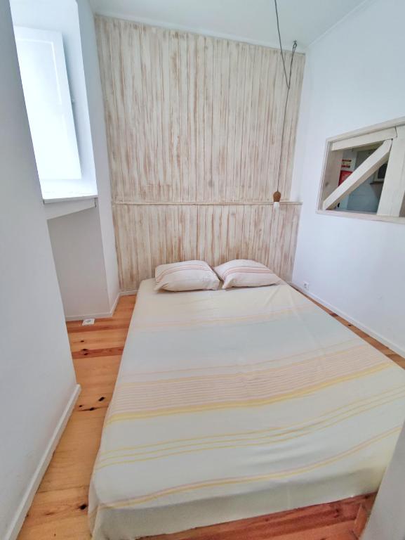 Postel nebo postele na pokoji v ubytování Small lovely studio