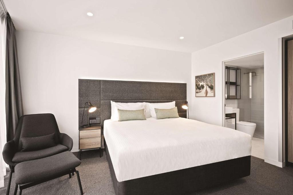 Postel nebo postele na pokoji v ubytování Vibe Hotel Melbourne