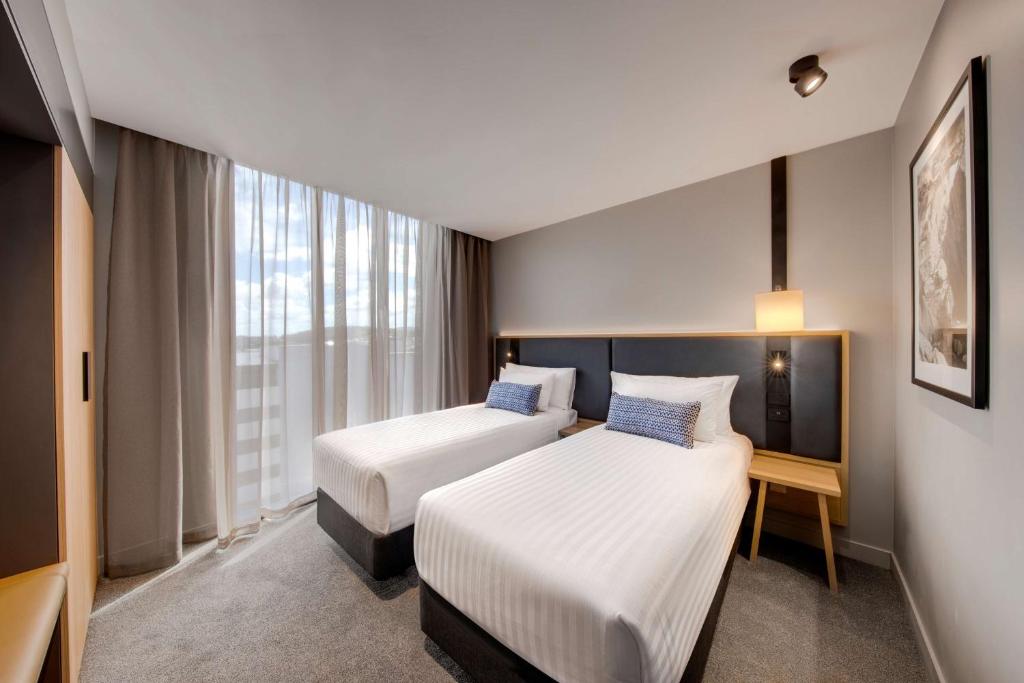 Postel nebo postele na pokoji v ubytování Vibe Hotel Hobart