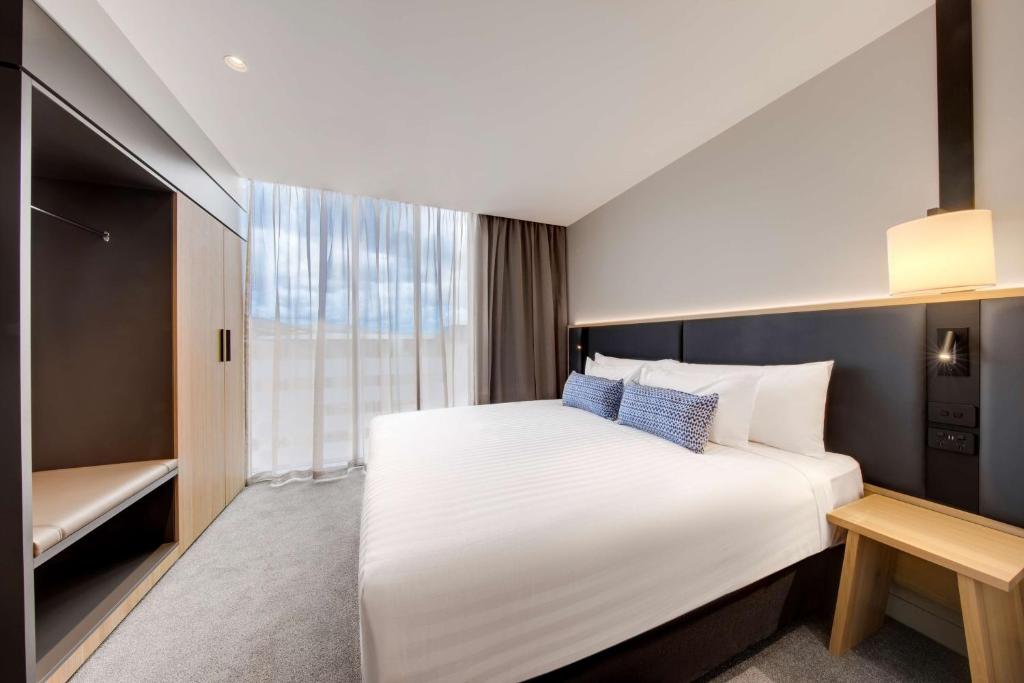 Postel nebo postele na pokoji v ubytování Vibe Hotel Hobart