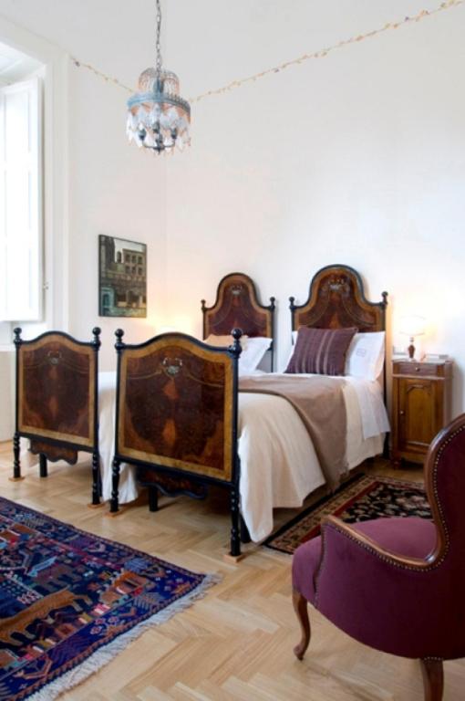 Postel nebo postele na pokoji v ubytování Palazzo De Giorgi B&B