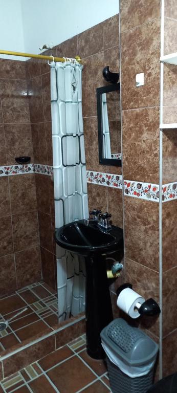 Koupelna v ubytování Apartamento Santorini Colombiano