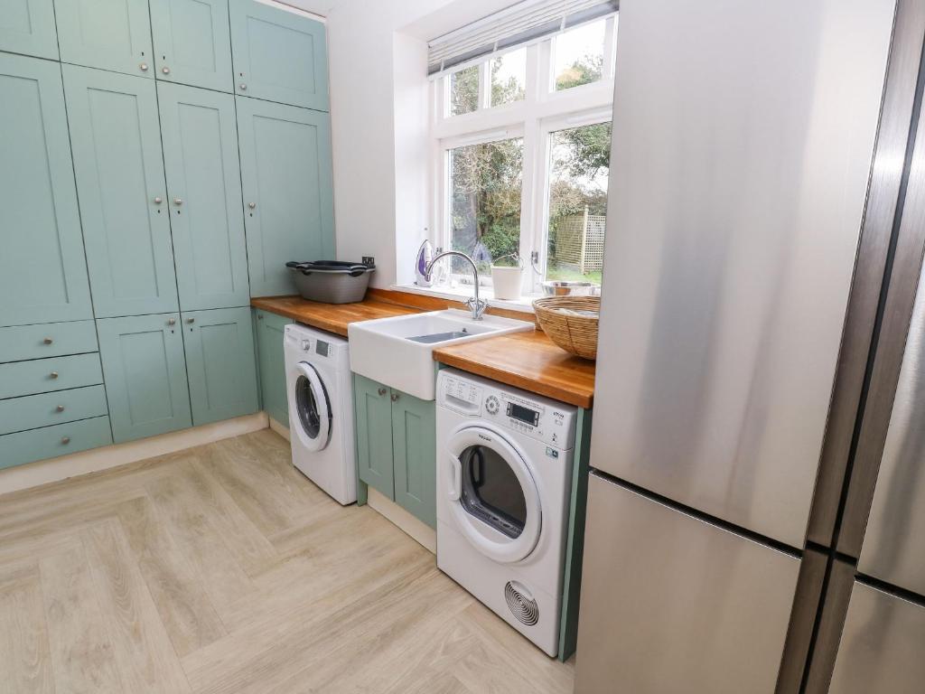 Kuchyň nebo kuchyňský kout v ubytování Penarvon House