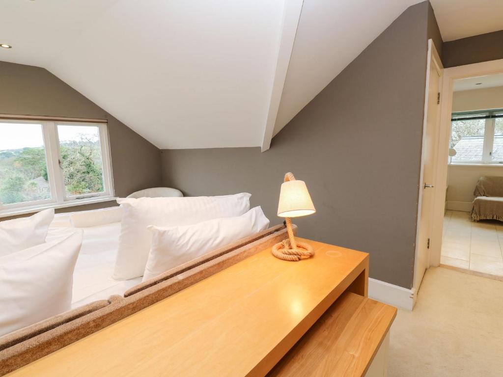 Postel nebo postele na pokoji v ubytování Penarvon House