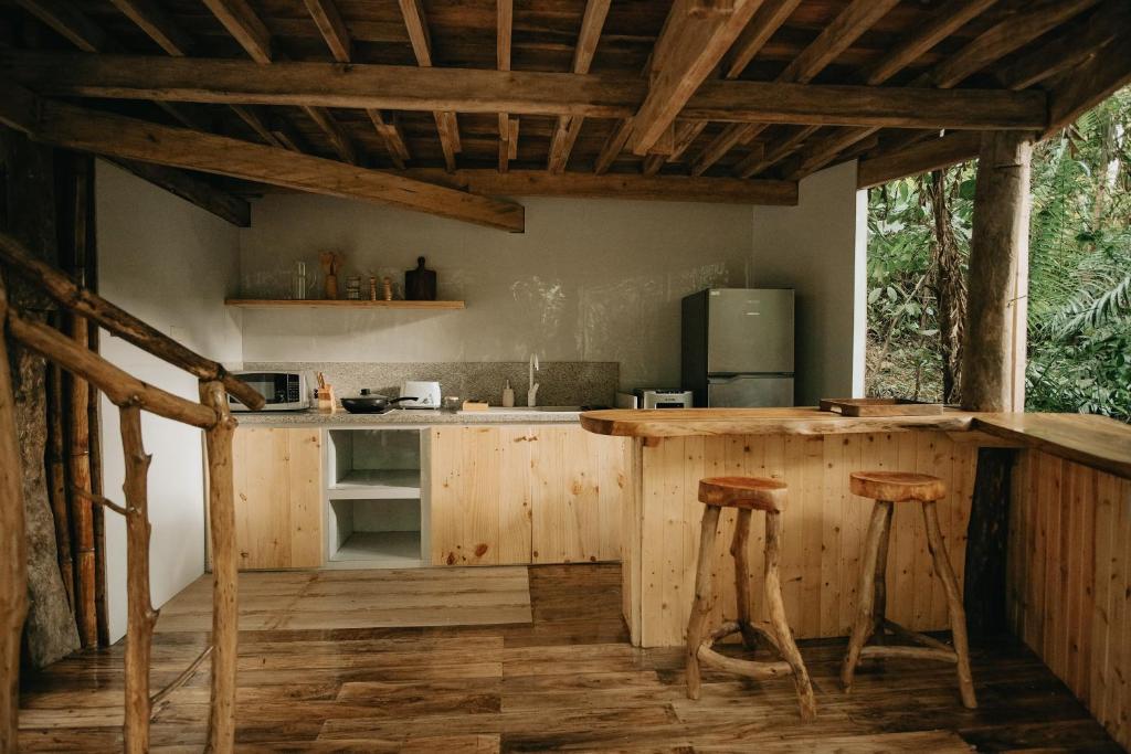 Kuchyň nebo kuchyňský kout v ubytování Treehouse de Valentine