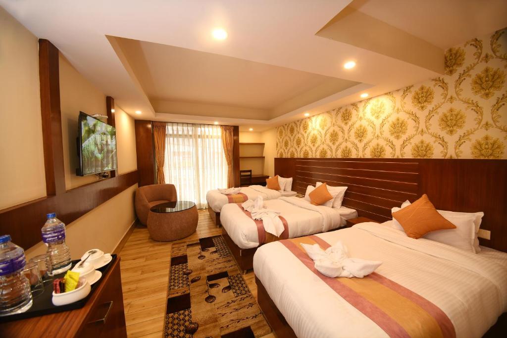 Postel nebo postele na pokoji v ubytování Hotel Simal