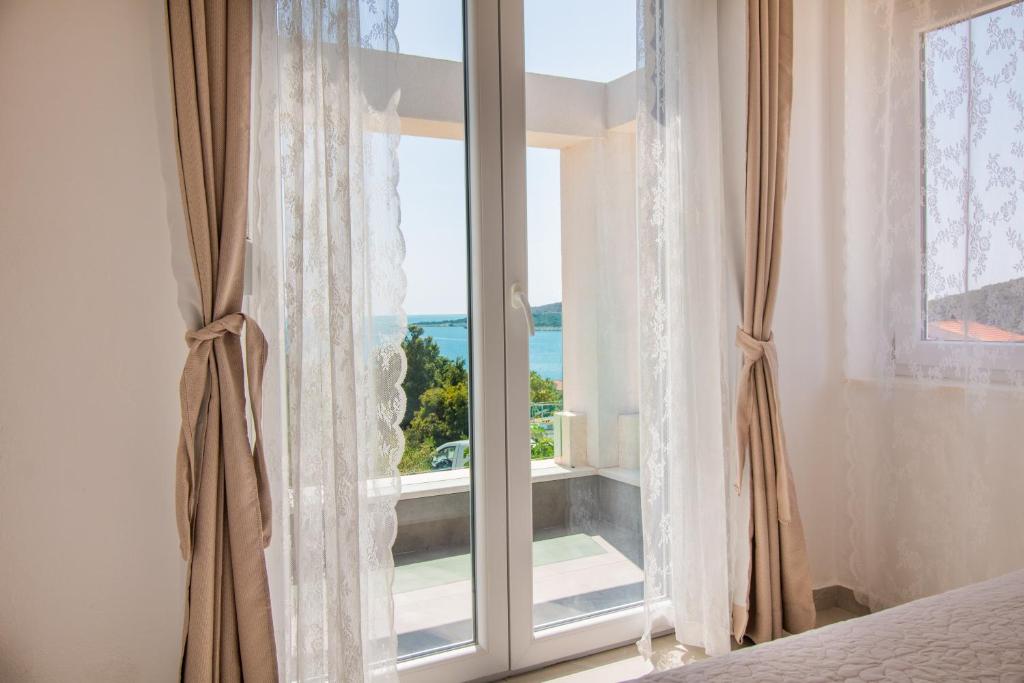 Postel nebo postele na pokoji v ubytování Holiday Home Sevid