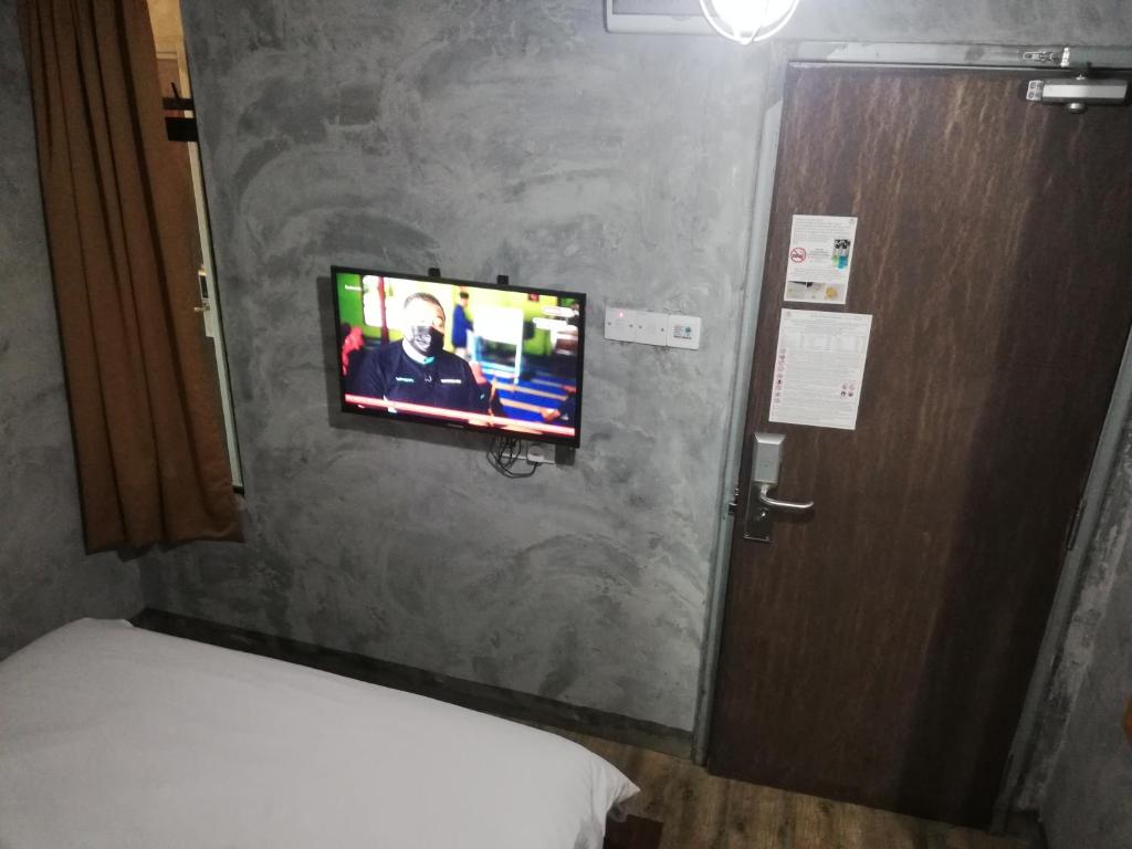 En TV eller et underholdningssystem på Myera Hotel