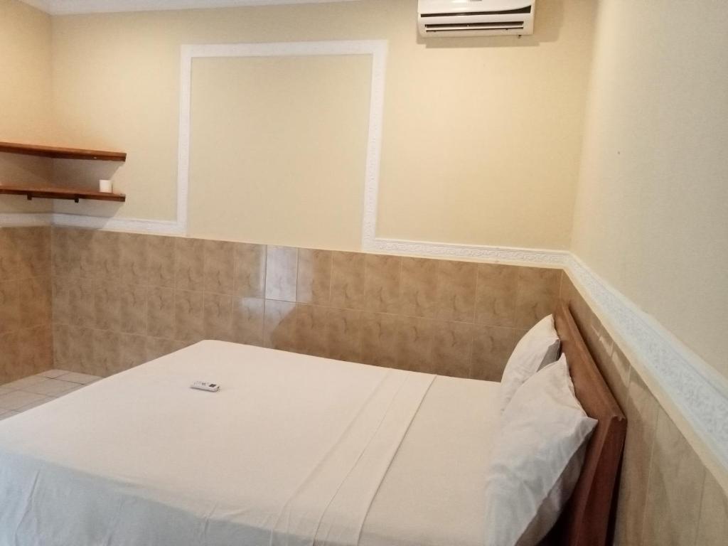 Postel nebo postele na pokoji v ubytování Homestay Lucu 2