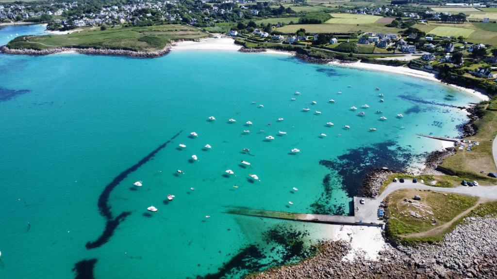 an aerial view of a harbor with boats in the water at MAISON YUKTI - Magnifique maison de charme proche plage in Lampaul-Ploudalmézeau