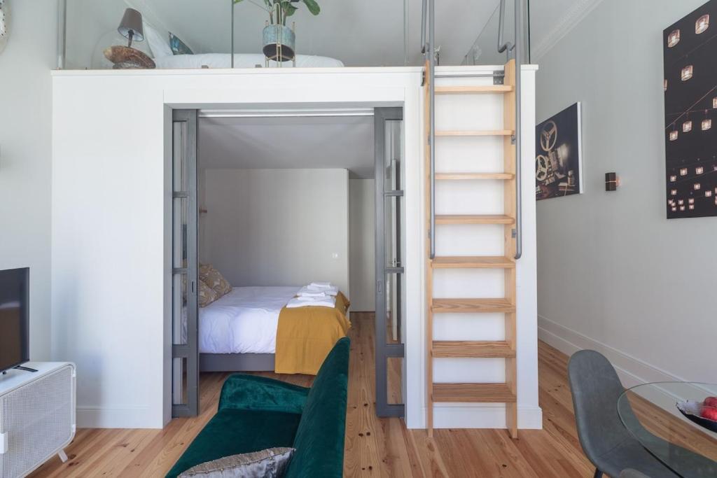 Postel nebo postele na pokoji v ubytování Cinema Luxury House