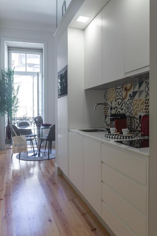 Kuchyň nebo kuchyňský kout v ubytování Cinema Luxury House