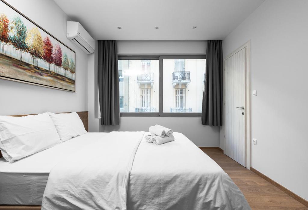 Posteľ alebo postele v izbe v ubytovaní Ipanema, Nilie Hospitality MGMT