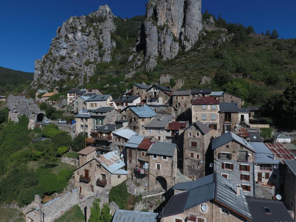 a village on the side of a mountain at GITE RUPICAPRA MERCANTOUR in Roubion