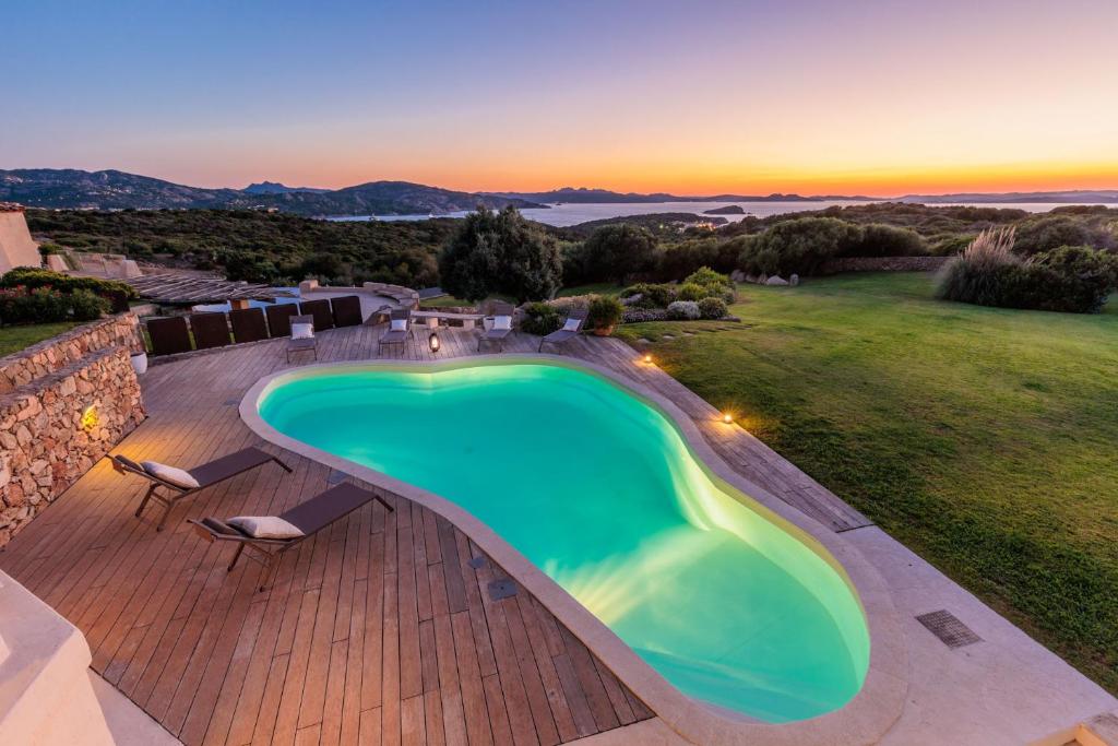 an overhead view of a swimming pool on a patio at Villa Smeralda, with Private Pool in Porto Cervo, Sardinia in Porto Cervo