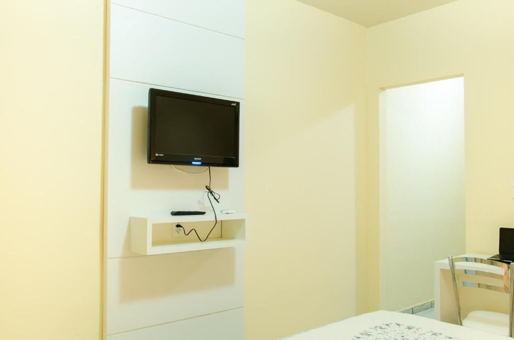 TV a/nebo společenská místnost v ubytování Pousada Bela Vista